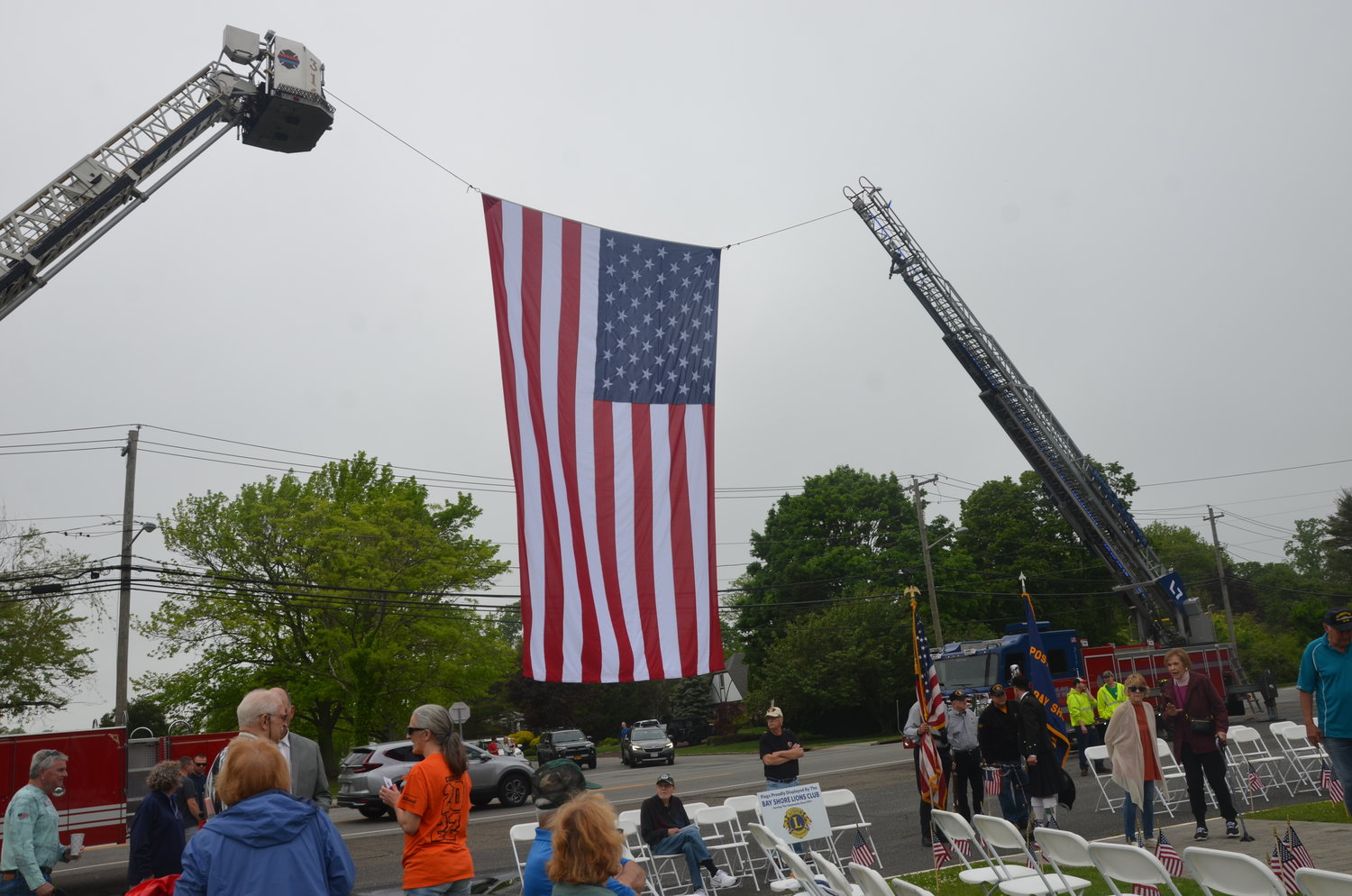The Bay Shore Fire Department displayed an American flag at the head of the harbor.